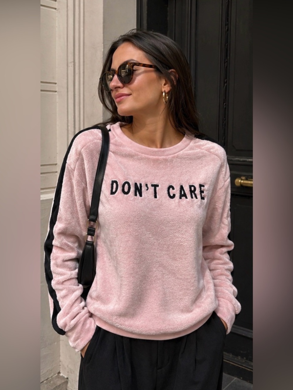 PINK FLEECE SWEATSHIRT “DON’T CARE” TEXT